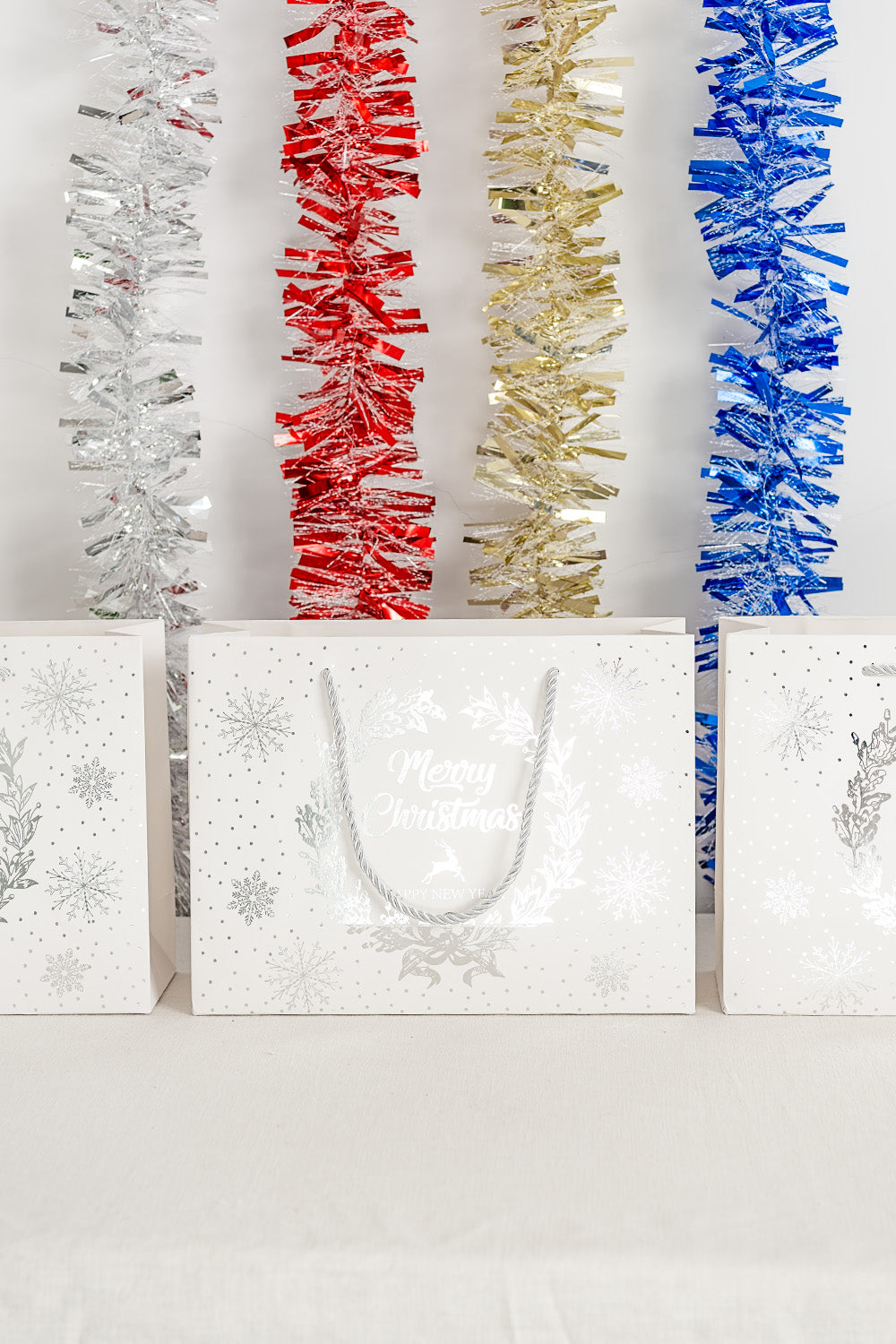 Crisky Merry Christmas & Happy New Year Gift Bags, Foil Silver, 11" x 8" x 4", Medium Bags 12 Pcs